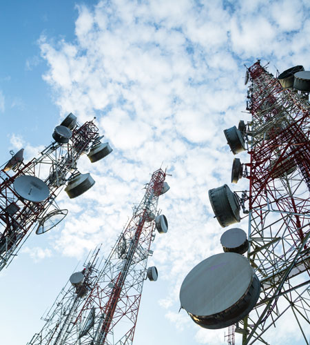 Telecommunication towers. Hamel-Smith practices Telecoms, IT and E-Commerce Law